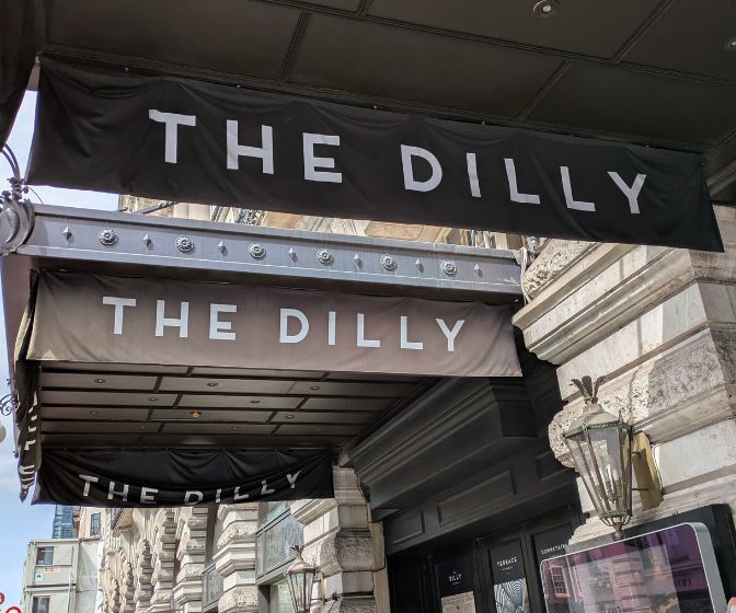 The Dilly Hotel Review: A Delicious Sanctuary in a Colorful Circus
